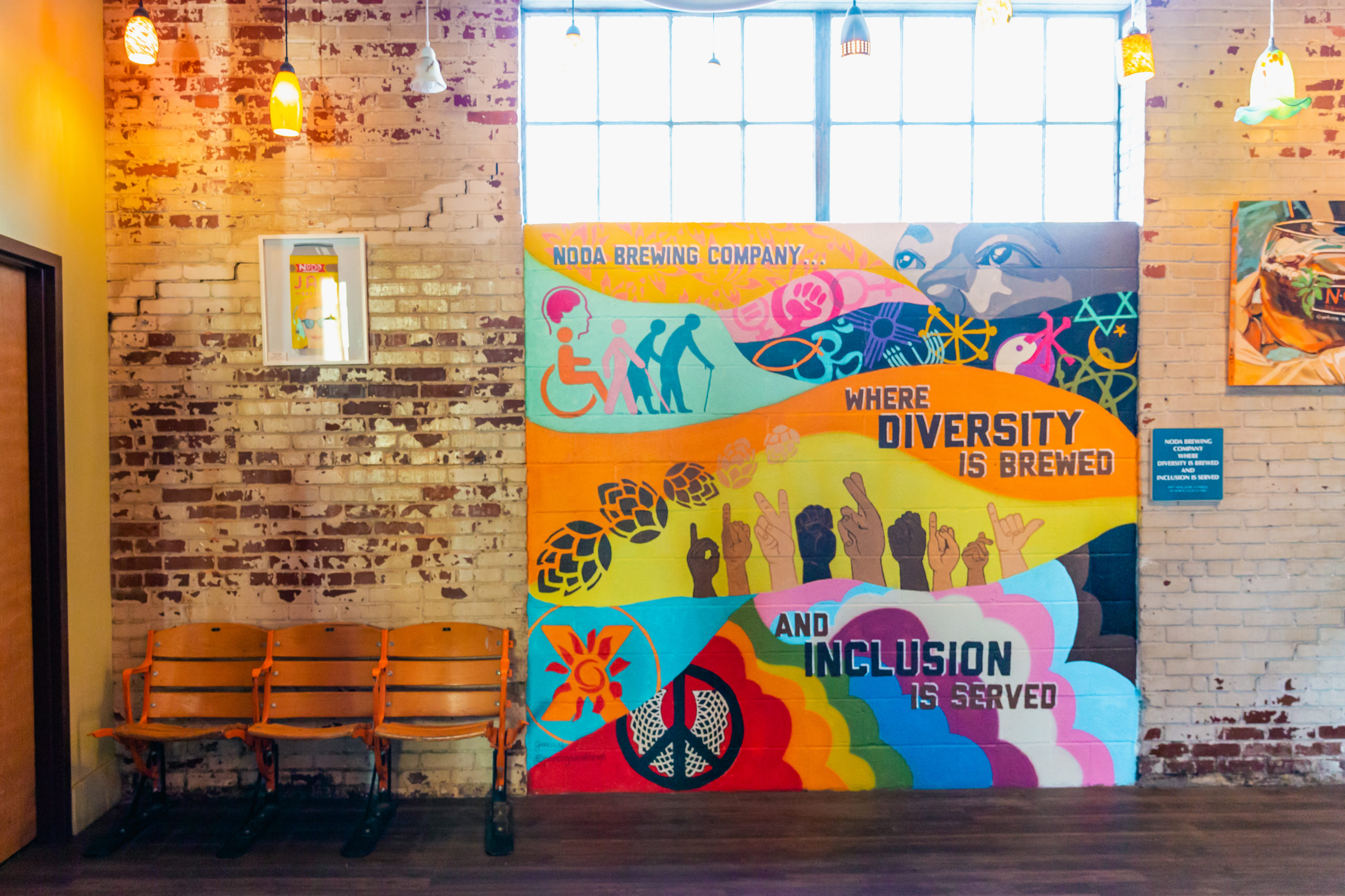 Wall art celebrating inclusivity and diversity