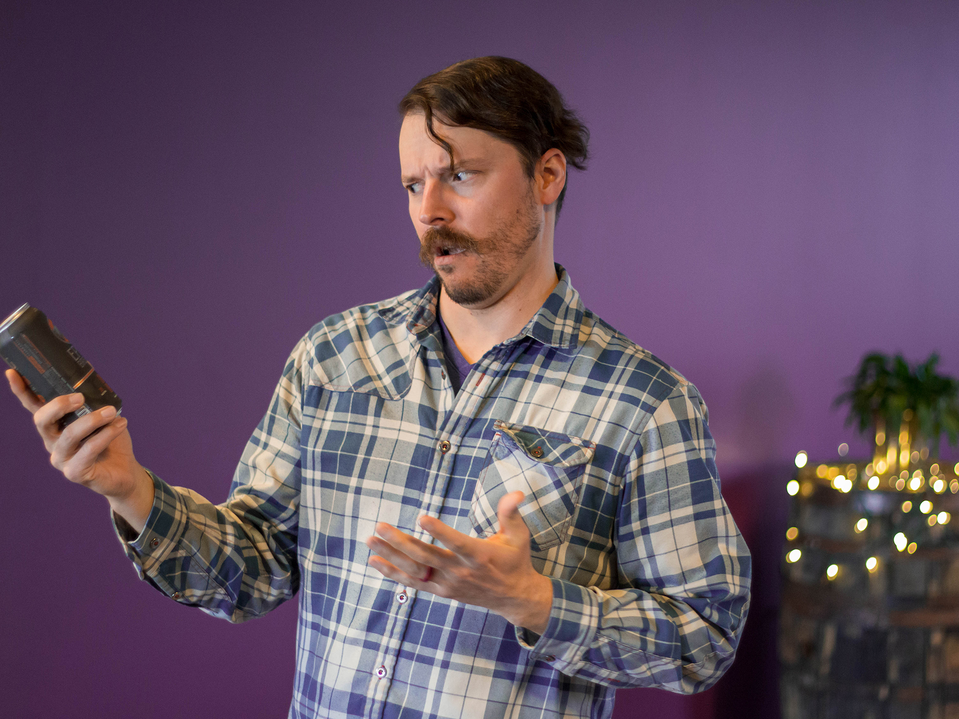 Dan Watson holding a beer can