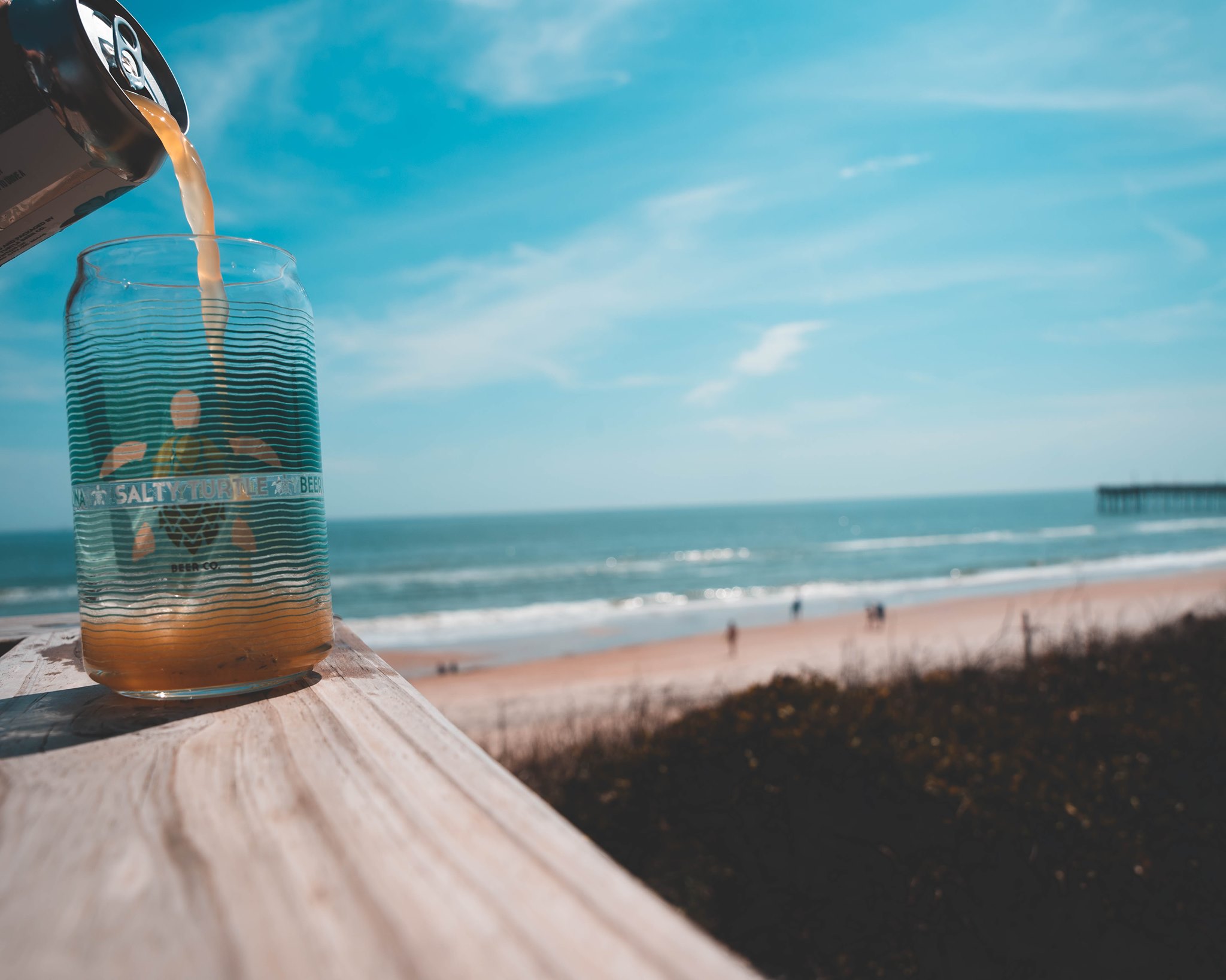 Salty Turtle pours beer by the beach